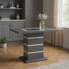 47" dark gray and black glass square bar table with faux crystal accents and a wood base, set in a bright room with decor.