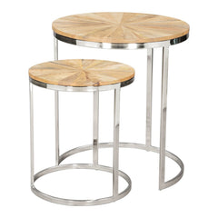 Set of two natural wood and silver iron round frame nested tables with a starburst design on the tabletops.