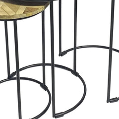 Set of three nested tables featuring natural and black solid wood tops with iron round frames. Stylish and functional design.