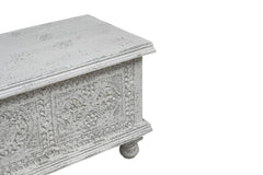 54" White Solid Wood Medallion Ottoman with intricate floral carvings and storage space, featuring a textured surface and rou
