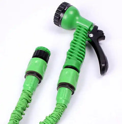 Expandable hose & pressure washer in green with 7 spray modes for garden use. Ideal for all cleaning needs in home & garden watering tasks.